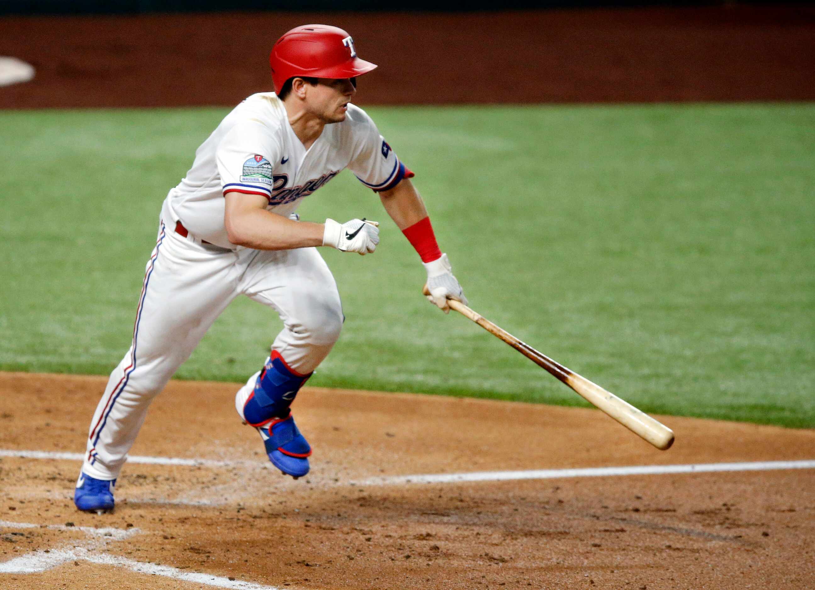 Texas Rangers batter Nick Solak hits a two RBI single in the first inning against the...