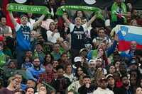 Fans celebrate “I Feel Slovenia” night during the first half of an NBA basketball game...