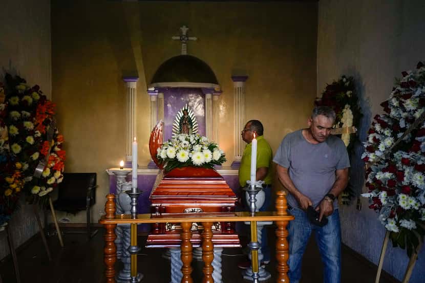 Mourners attended the wake of mayoral candidate Armando Perez in Maravatio, Michoacan state,...