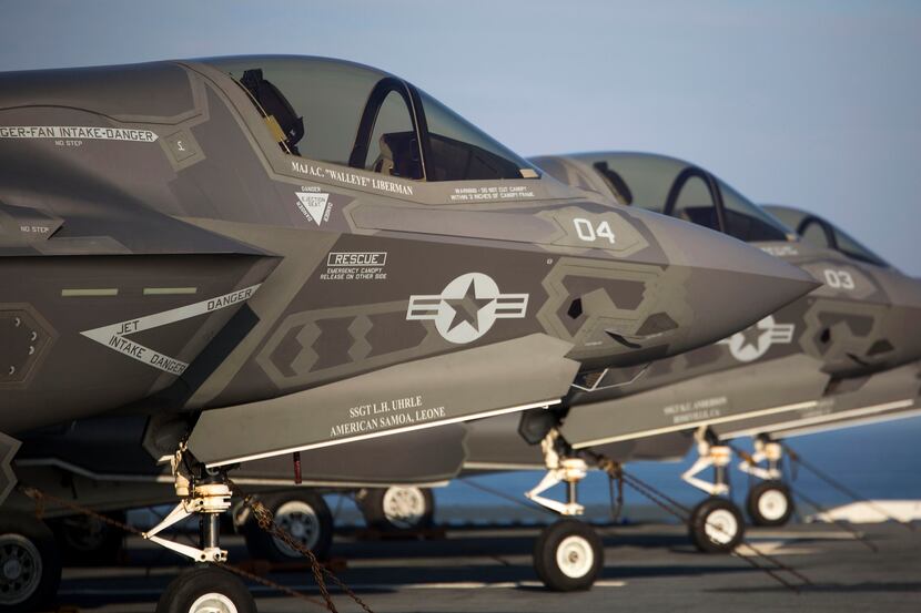  Four F-35B Lighting II Joint Strike Fighters sit secured to the deck of the USS Wasp In...