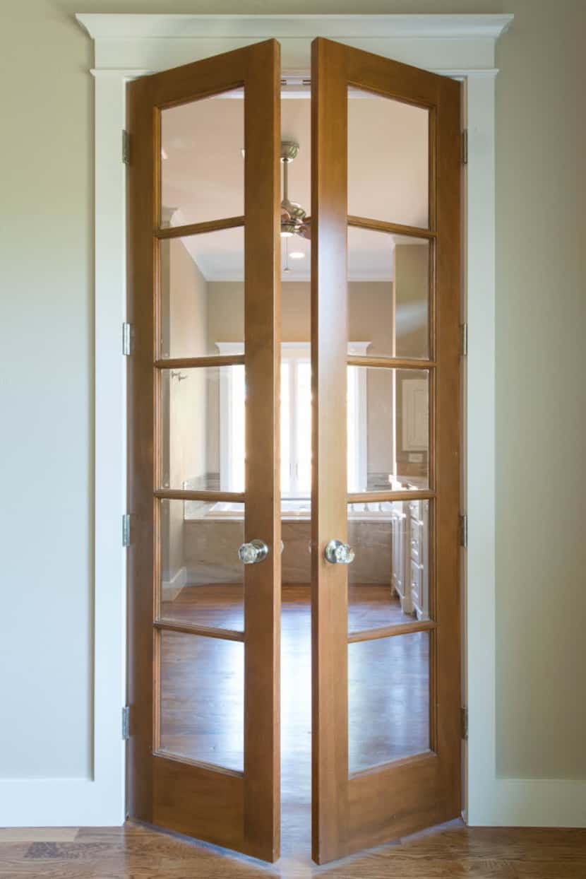 Versatile French doors with five glass panels are perfect for a home office or bath.