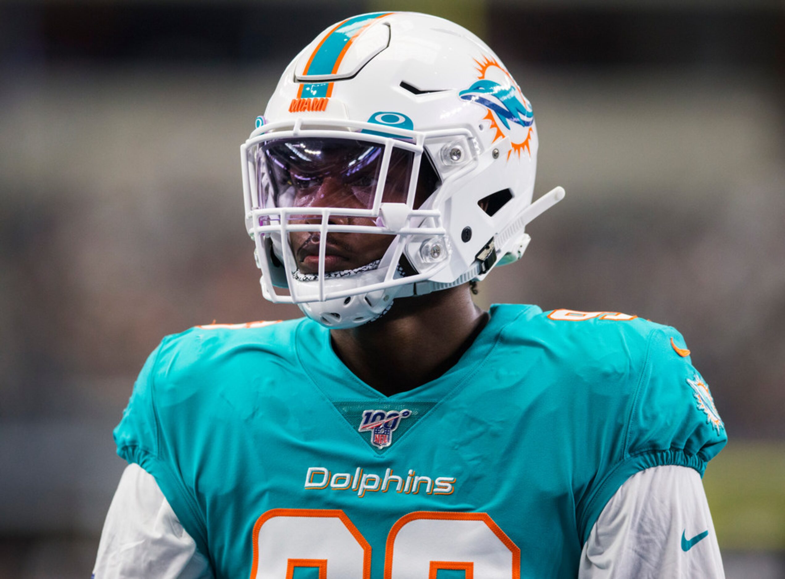 Miami Dolphins defensive end Taco Charlton (96) warms up before an NFL game between the...