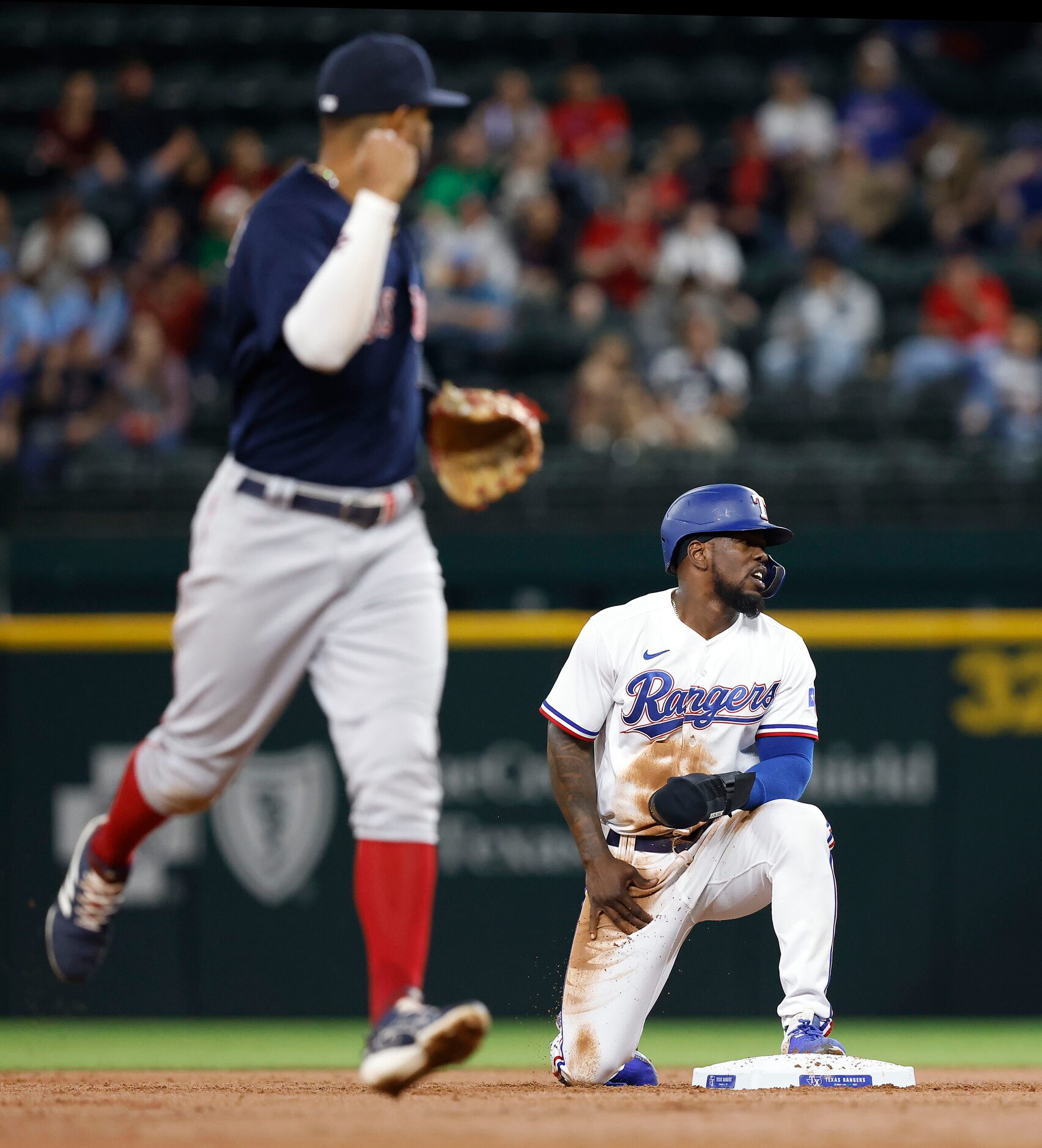 Texas Rangers Adolis Garcia (53) reacts after being thrown out by Boston Red Sox third...