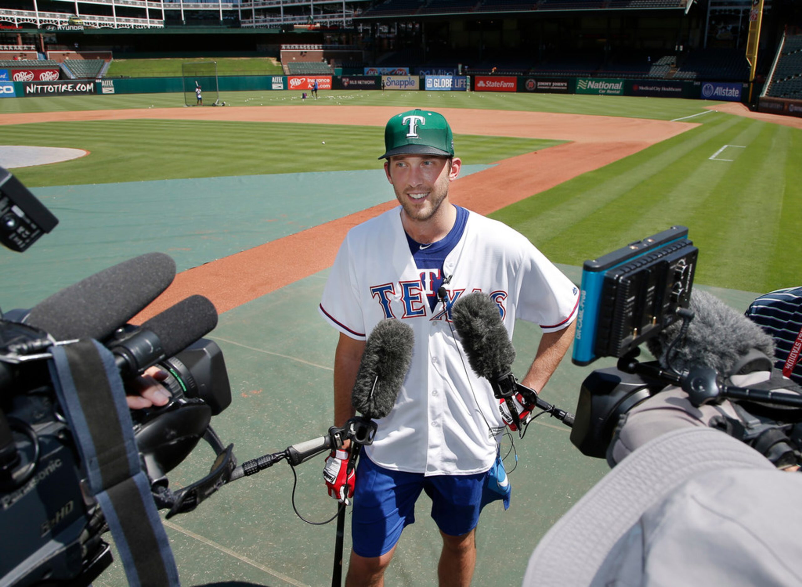 Dallas Stars goalie Ben Bishop speaks to the media after participating in a batting practice...