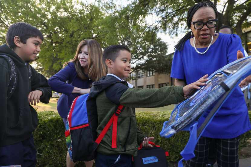 Dallas ISD superintendent Stephanie Elizalde (center) and  Cynt Marshall (right), CEO of the...