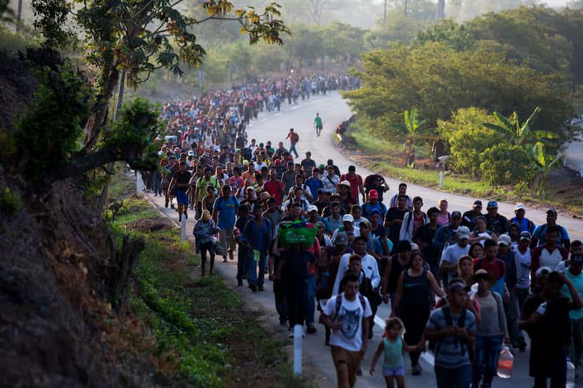 In this April 20, 2019, file photo, Central American migrants, part of a caravan hoping to...