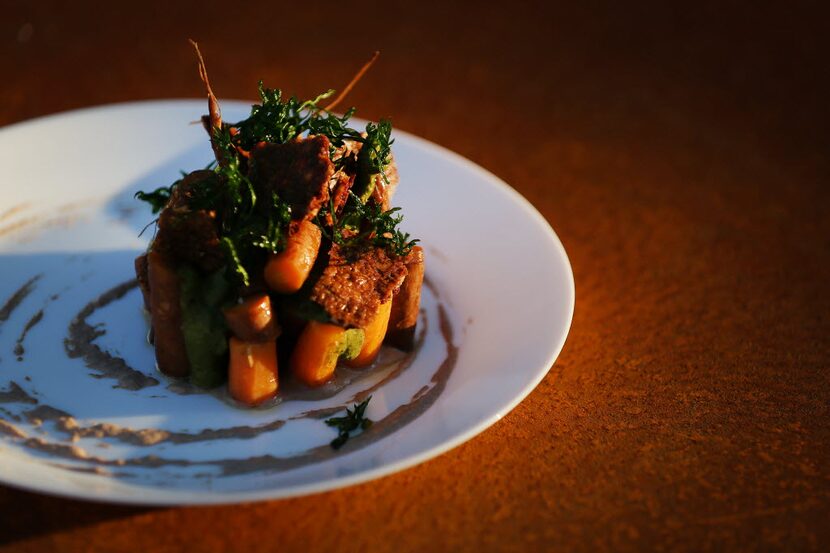 Norris' smoked Tassione Farms carrots with Kamut wheat, charred greens, San Saba pecan puree...