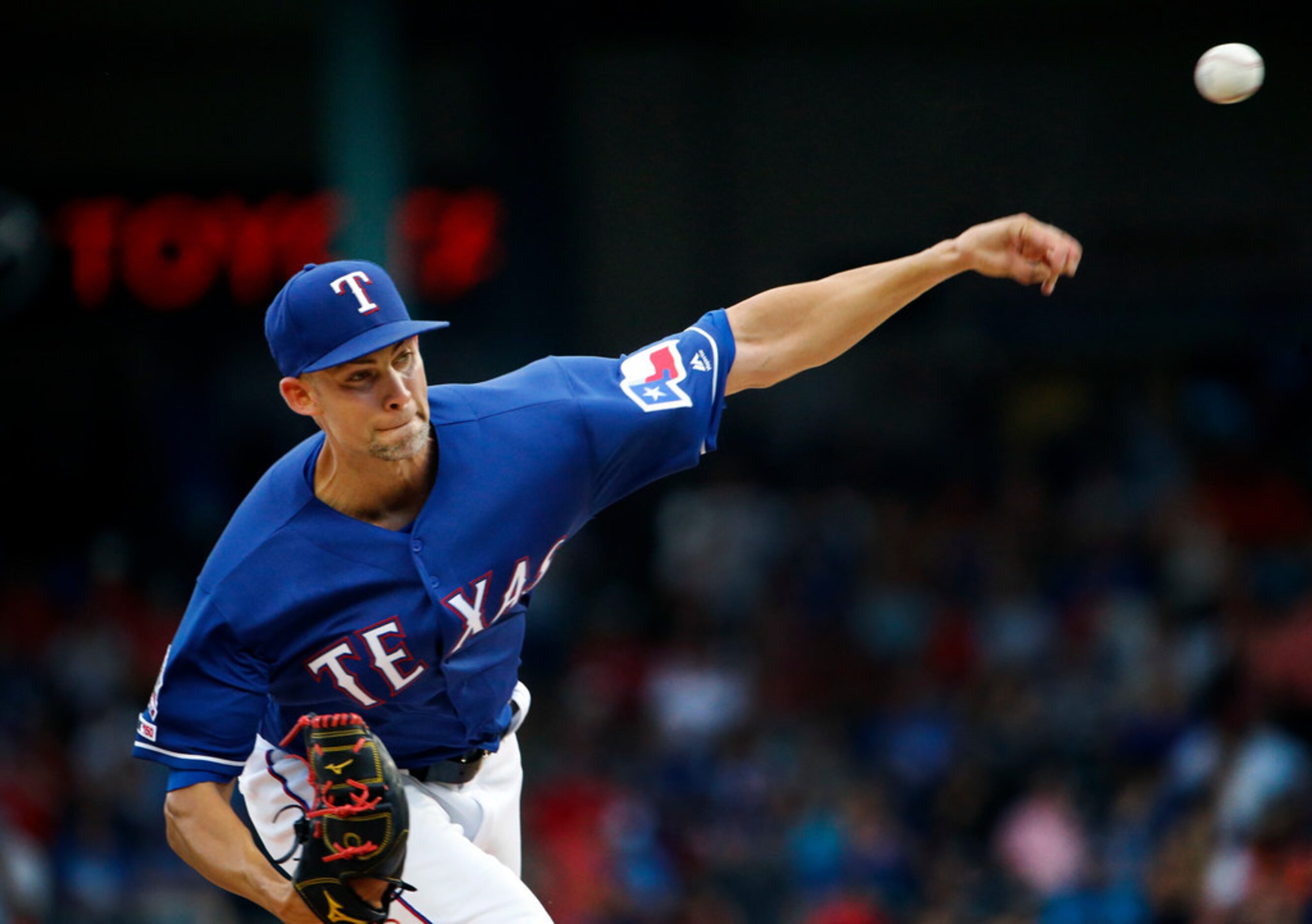 Texas Rangers starting pitcher Mike Minor (23) throws against the Houston Astros in the...