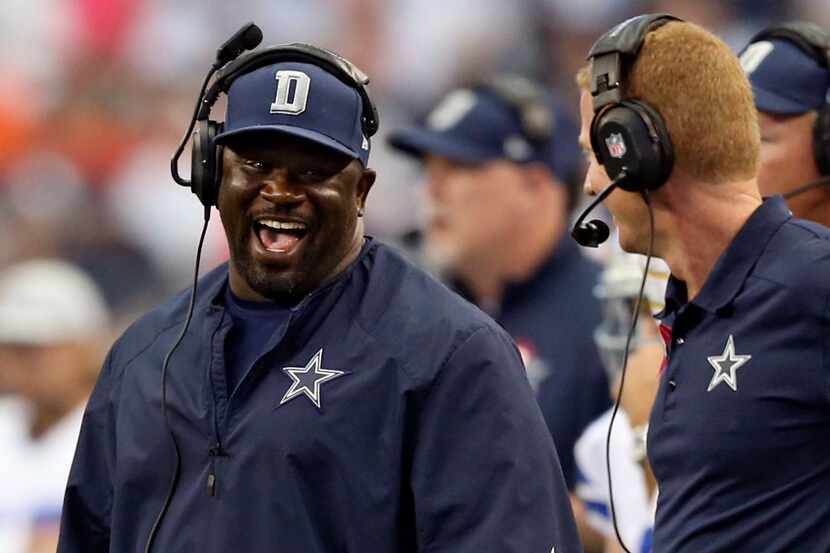 Dallas Cowboys head coach Jason Garrett and Dallas Cowboys running backs coach Gary Brown...