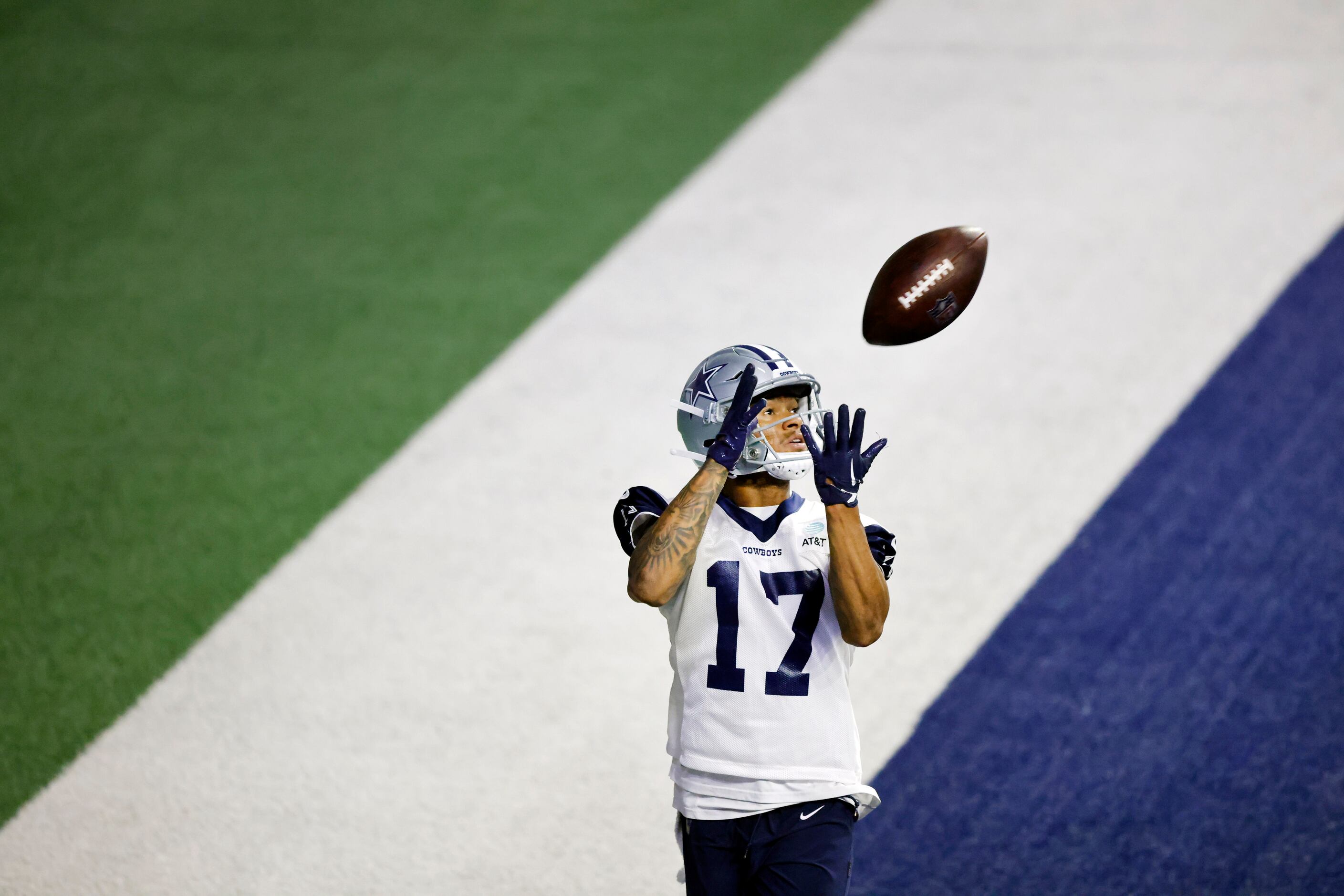 Dallas Cowboys wide receiver Dennis Houston (17) catches a pass in the back of the end zone...