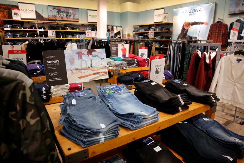 Men's Arizona Jeans brand clothing is on display inside the J.C. Penney at Timber Creek...