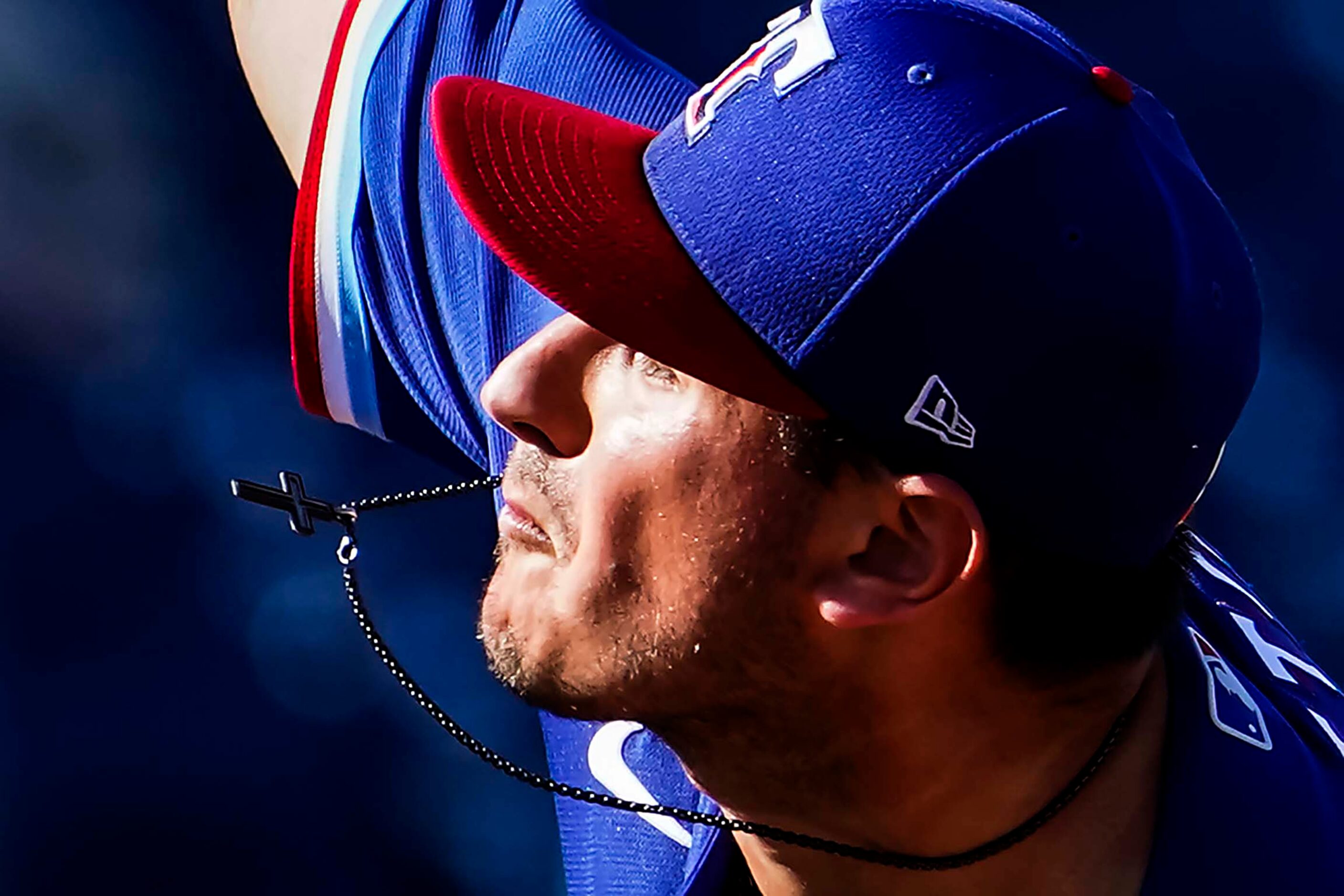 Texas Rangers pitcher Joe Gatto delivers during the seventh inning of a spring training game...