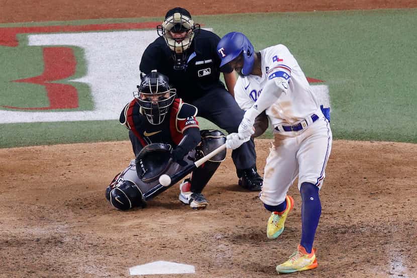 Texas Rangers right fielder Adolis Garcia (53) hits a winning home run during the eleventh...