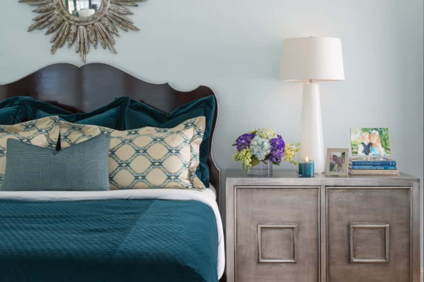 Shay Geyer mixes textures and prints to create a rich-looking bed.