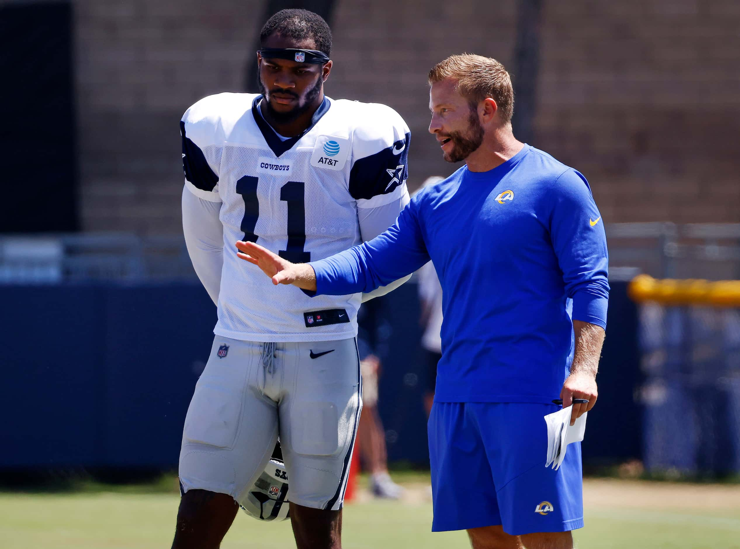 Dallas Cowboys linebacker Micah Parsons (11) listens to Los Angeles Rams head coach Sean...