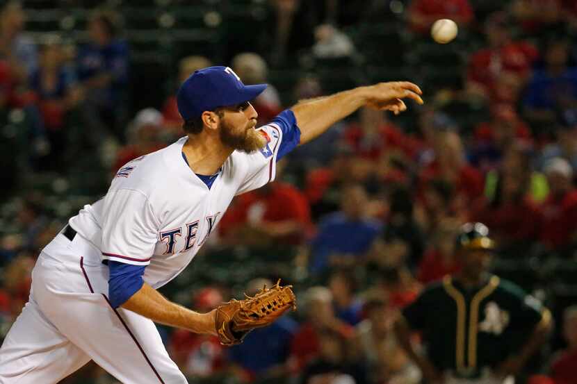 Texas pitcher Michael Kirkman is pictured during the Oakland Athletics vs. the Texas Rangers...