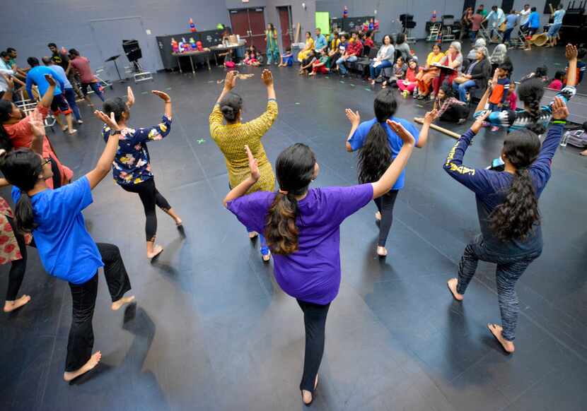Dancers from the cast of The Red Pashmina  rehearse at the Irving Arts Center on Sept. 9.