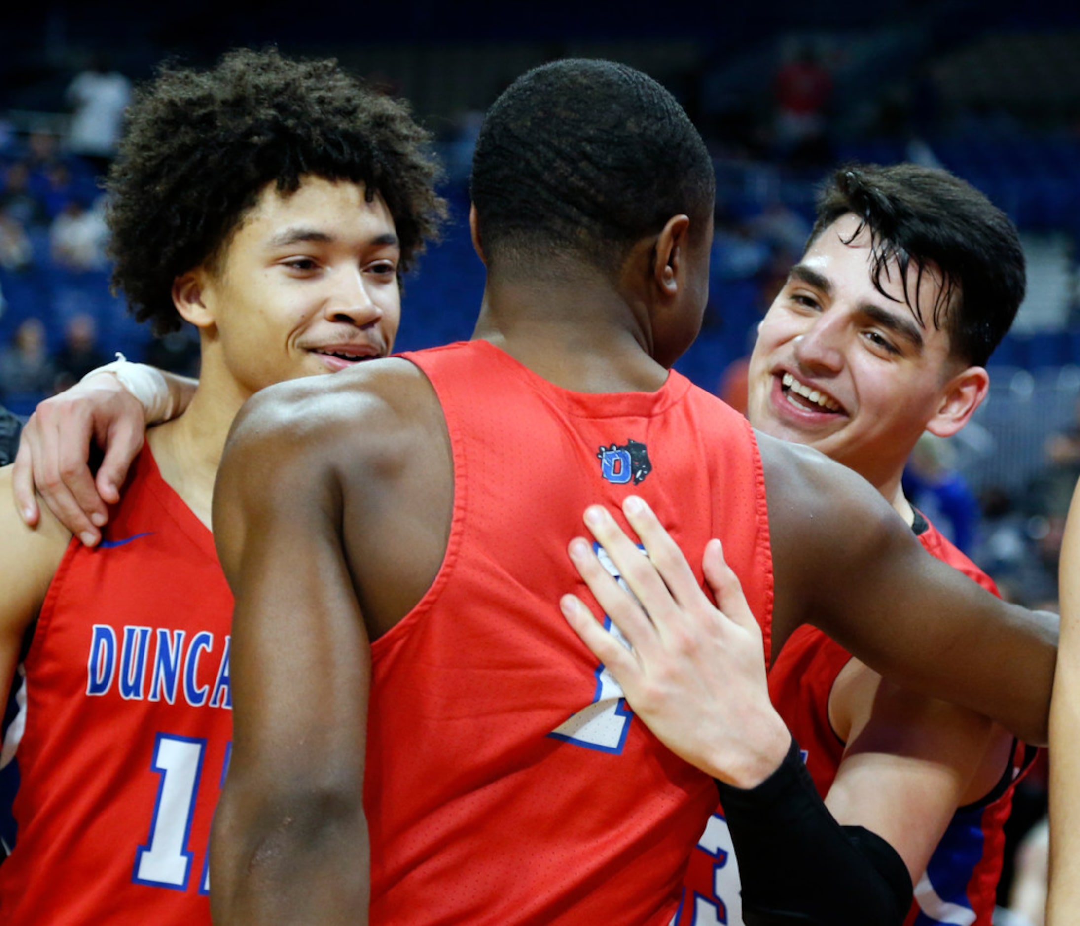 Duncanville's Miles Bennett #12,Duncanville's Keyaun Hoskin #1, and Duncanville's Derek Luna...