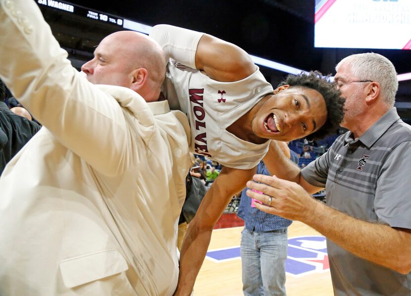 Mansfield Timberview's CJ Smith gets a ride from asst coach Matthew Workman. UIL boys...