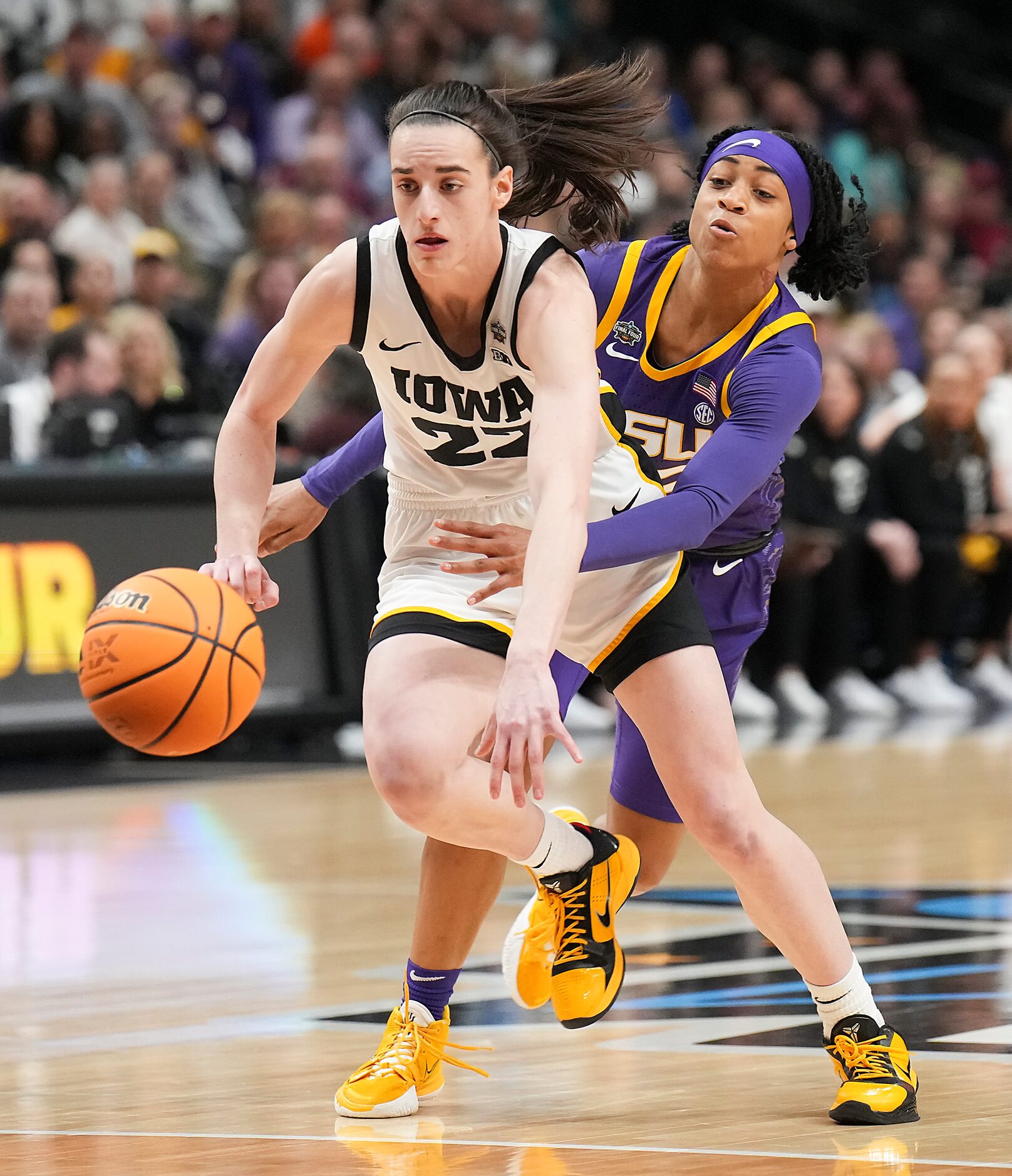 LSU guard Alexis Morris (45) steals the ball from Iowa guard Caitlin Clark (22) during the...