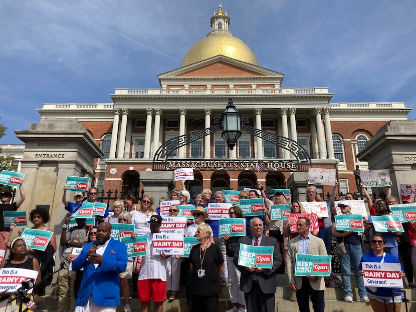 Protesters wanting to keep two Massachusetts hospitals open gather in front of the...