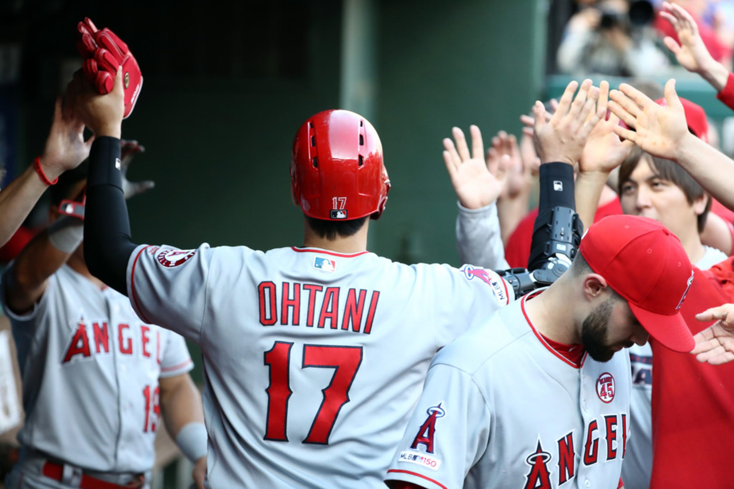 ARLINGTON, TEXAS - AUGUST 19:  Shohei Ohtani #17 of the Los Angeles Angels celebrates a run...