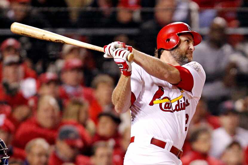 St. Louis Cardinals right fielder Lance Berkman hits a home run in the first inning during...