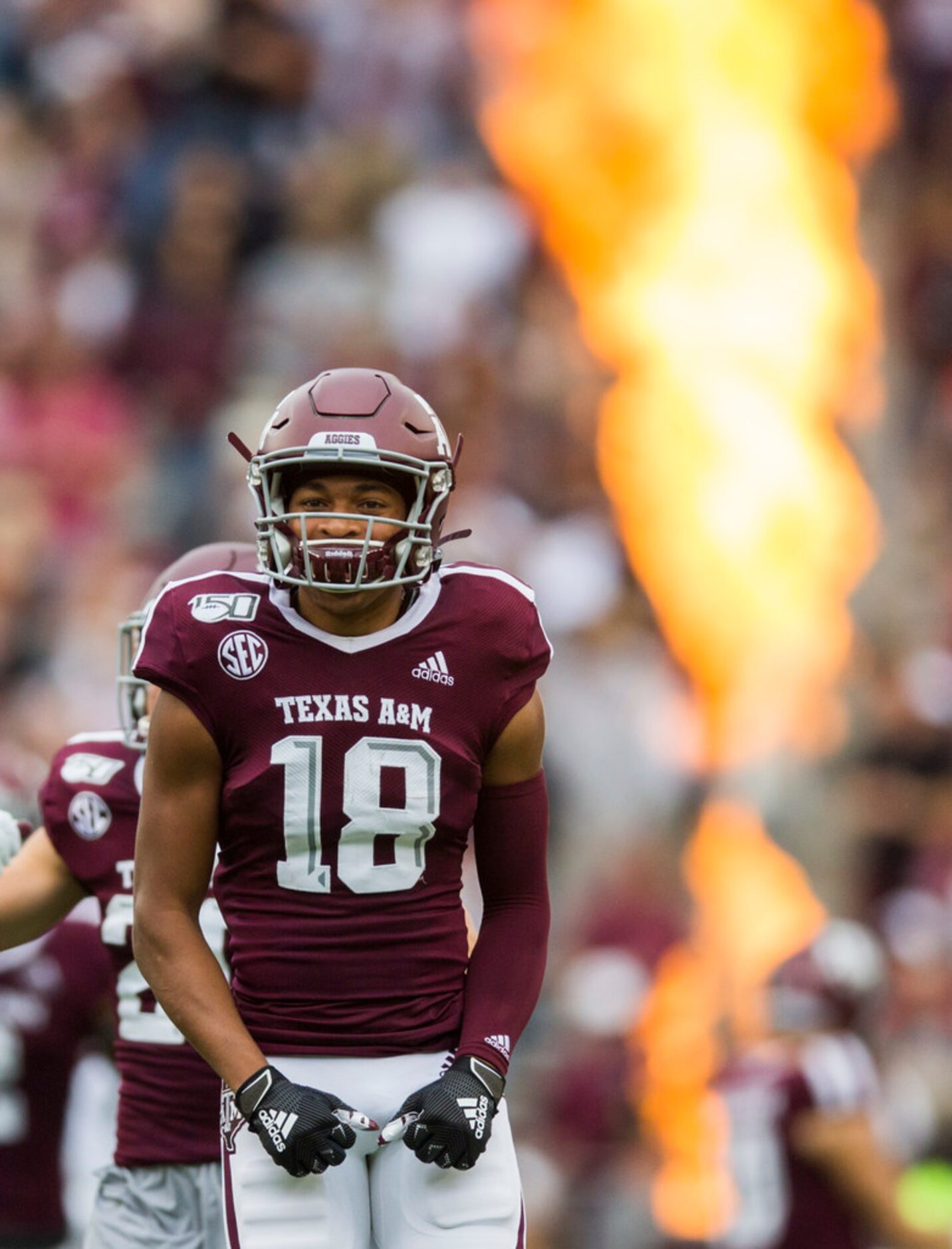 Texas A&M Aggies wide receiver Kam Brown (18) runs on the field before a college football...