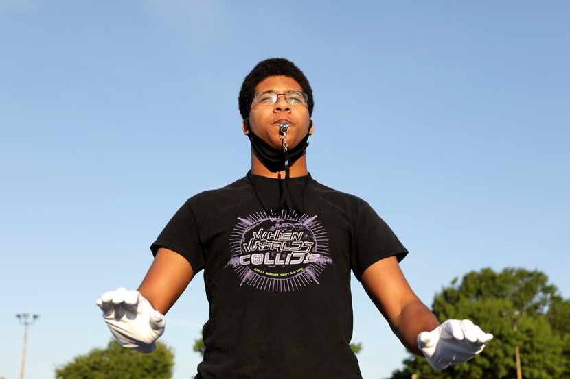 Senior David Bennette, one of the Mighty Ram Band’s three drum majors this fall, says the...