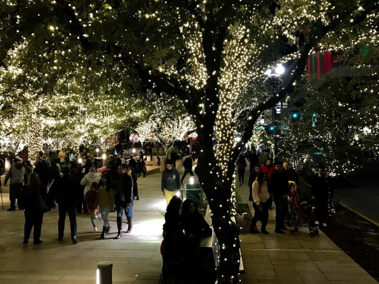 Border residents enjoy holiday festivities at a restored San Jacinto Plaza.