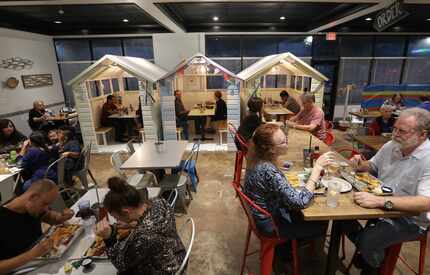 Fish & Fizz in Richardson had a nontraditional dining room with beach-themed memorabilia art...