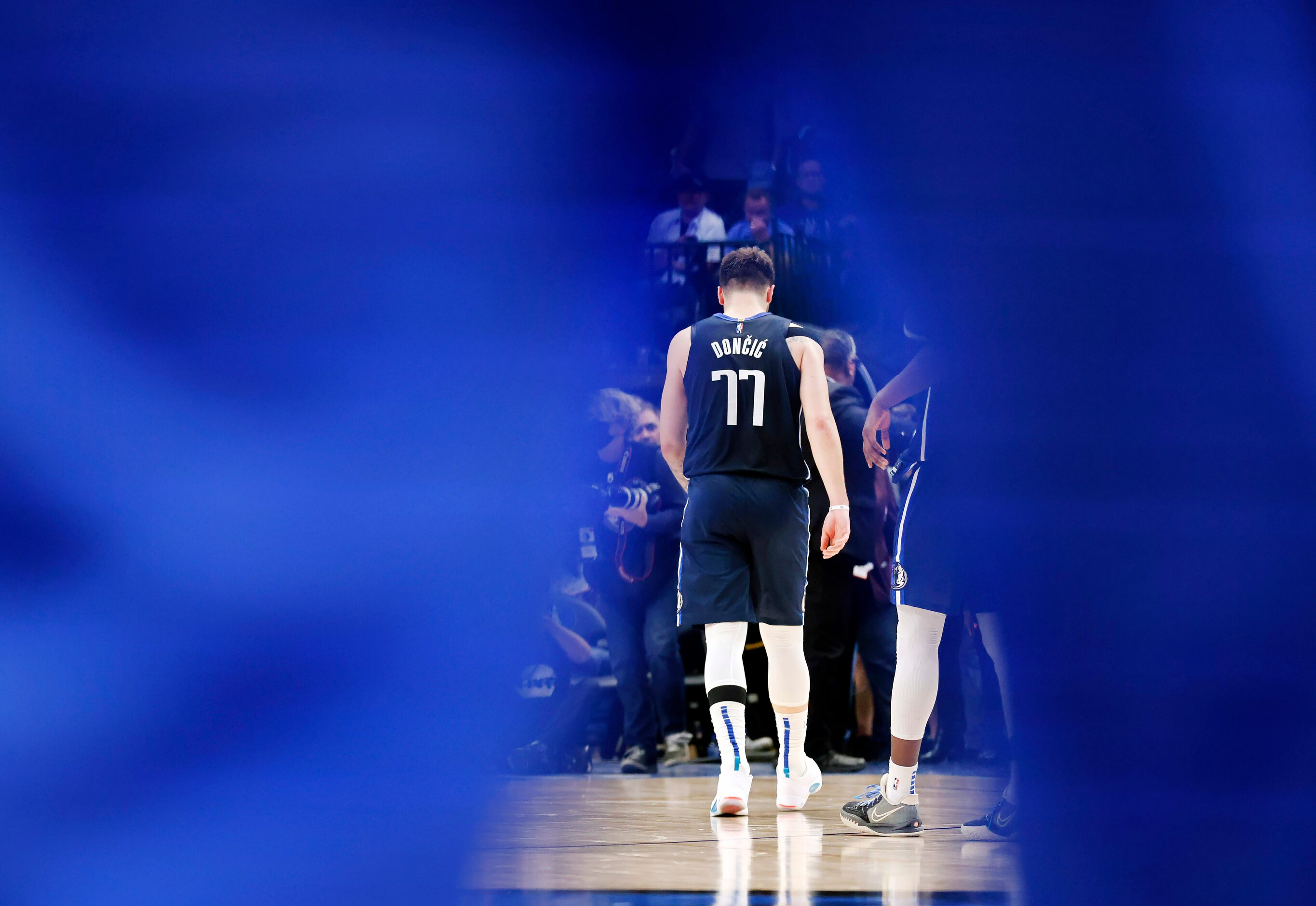 Dallas Mavericks guard Luka Doncic (77) walks straight for the locker room after timed...