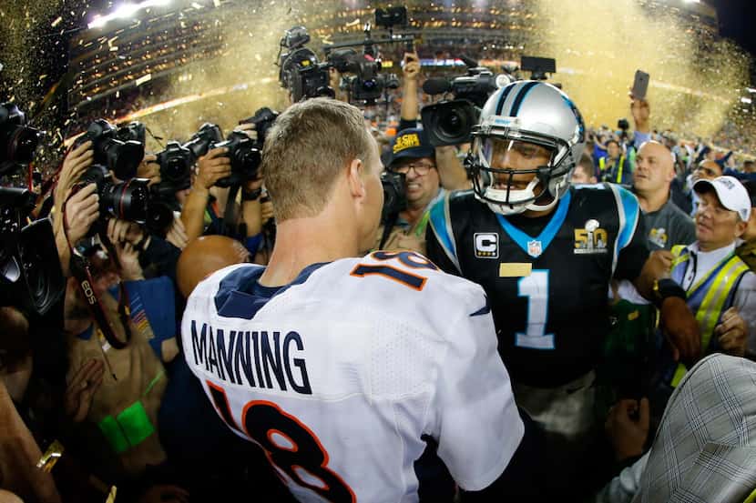 SANTA CLARA, CA - FEBRUARY 07:  Peyton Manning #18 of the Denver Broncos shakes hands with...