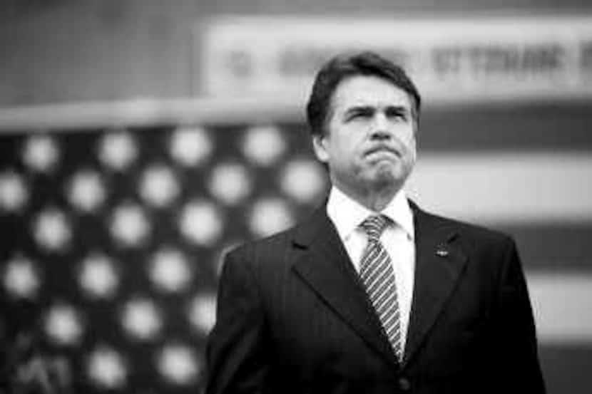 Gov. Rick Perry, who attended Veterans Day ceremonies in Dallas last week, says his use of...