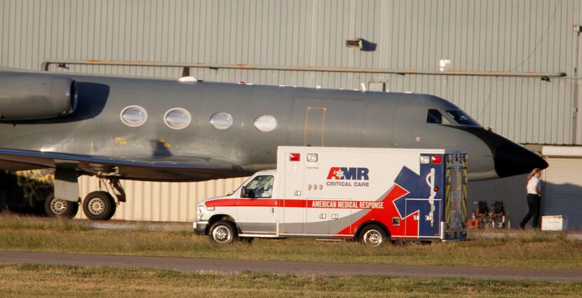 Nurse Nina Pham is transported to an air ambulance at Love Field for a flight to Maryland.