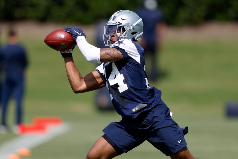 Dallas Cowboys rookie cornerback Kelvin Joseph (24) caches a pass during a defensive drill...