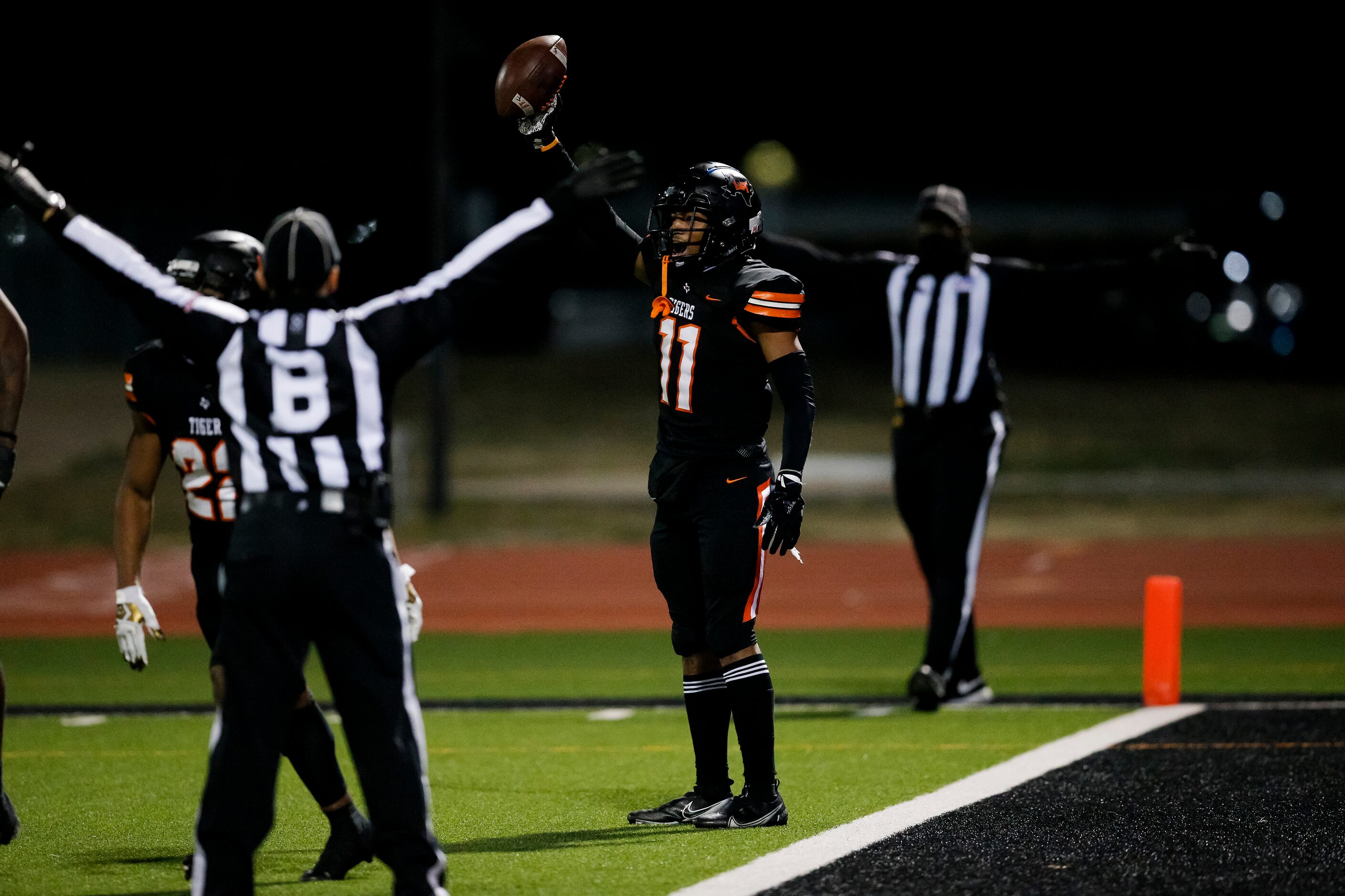 Lancaster senior linebacker Courtney Massingill (11) celebrates a punt to the one yard line...