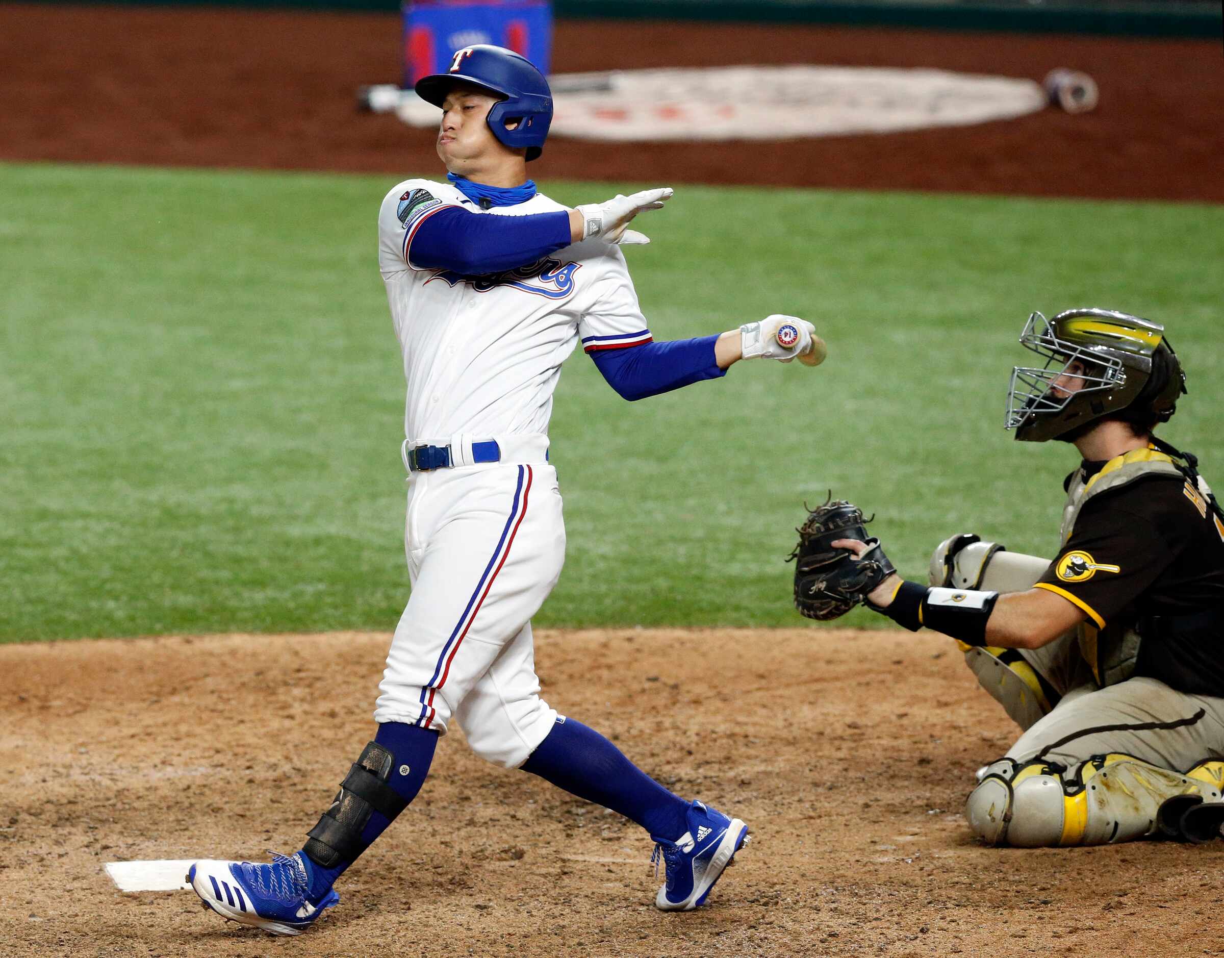 Texas Rangers Rob Refsnyder (14) struck out swinging during the ninth inning against the San...