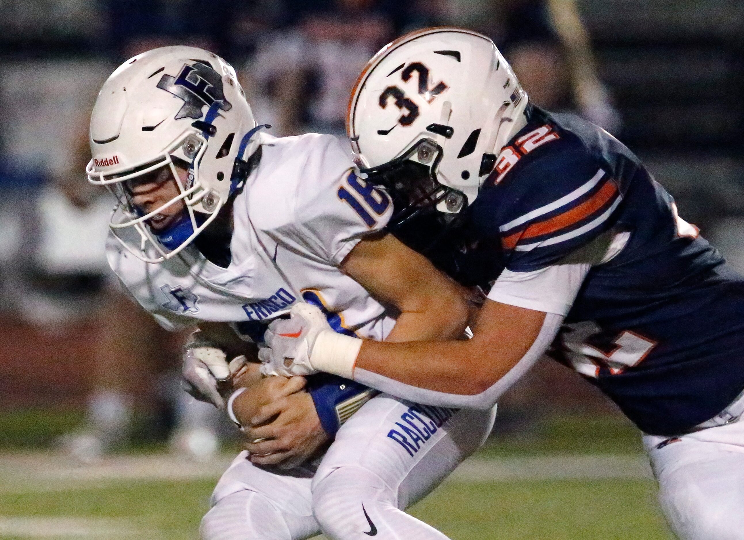 Frisco High School quarterback Camren Gibson (18) is sacked by Wakeland High School...