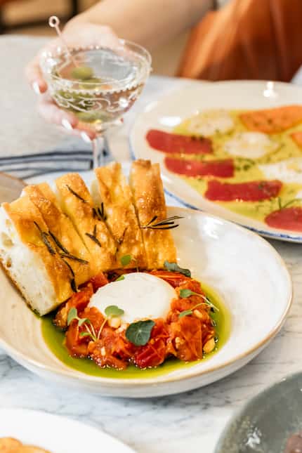 Burrata at Emilia's in Fort Worth comes with toasted tomato jam, basil oil and house-made...