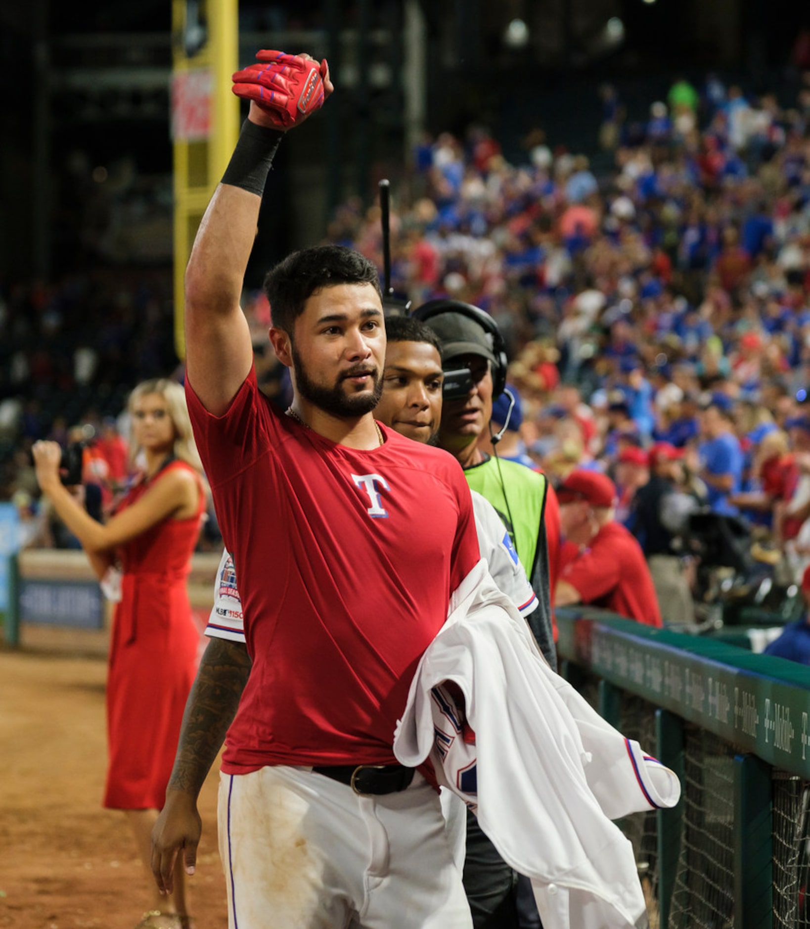 Texas Rangers third baseman Isiah Kiner-Falefa celebrates after driviong in the winning run...