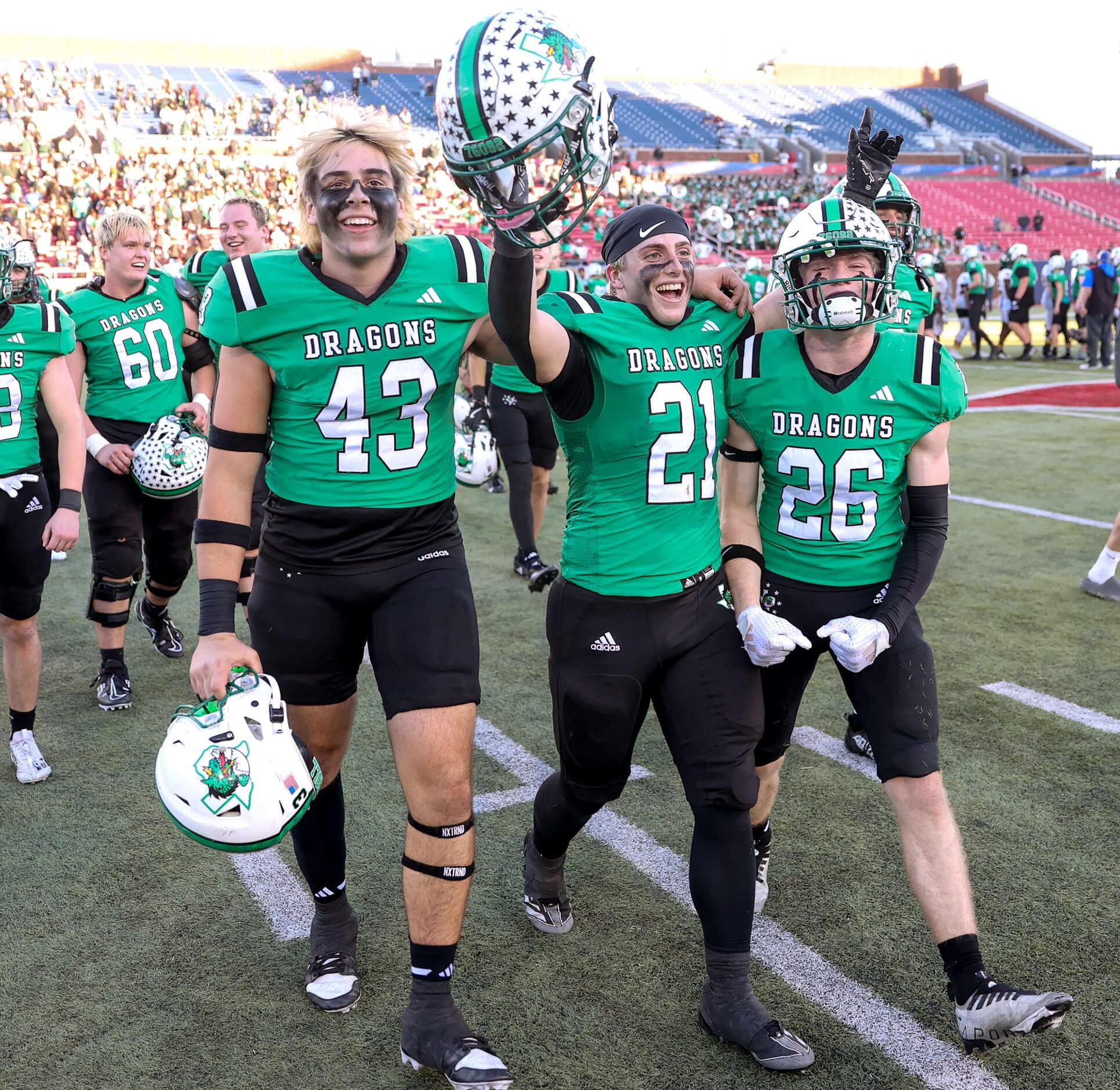 Southlake Carroll celebrates their victory over Longview, 20-17 in a Class 6A Division II...