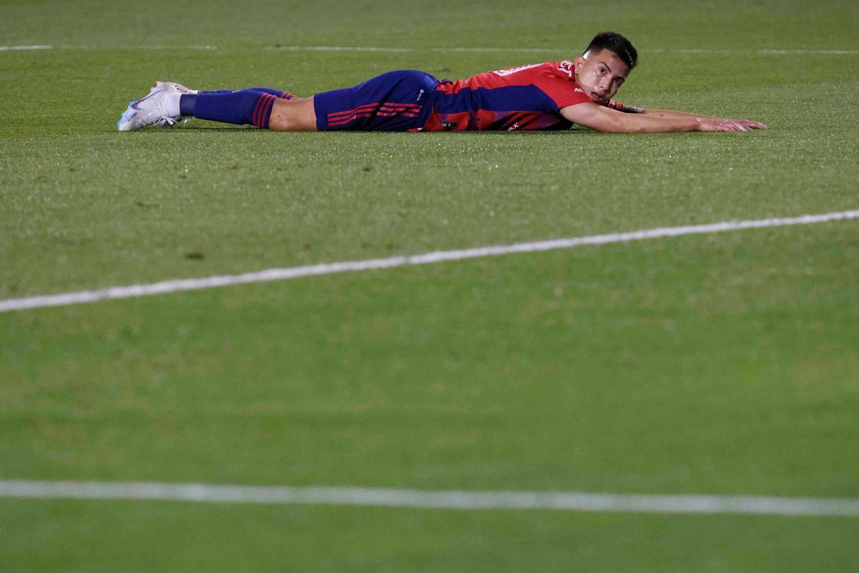 FC Dallas forward Alan Velasco looks dejected after missing to score a goal during the first...