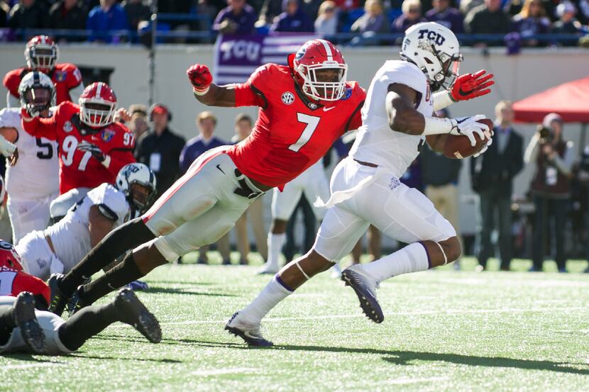 MEMPHIS, TN - DECEMBER 30: Wide receiver John Diarse #9 of the TCU Horned Frogs carries the...