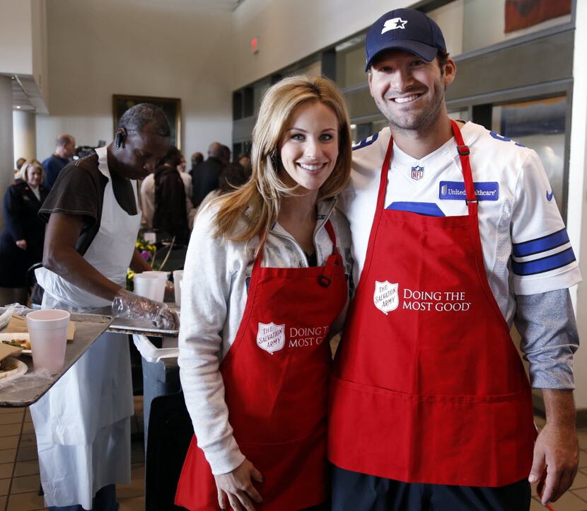 Candice Crawford and Tony Romo help serve Thanksgiving lunch at The Salvation Army's...