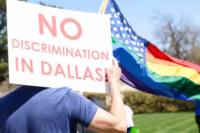 People gathered to protest outside the Dallas Arboretum in April.