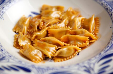 Il Pastaio is a pasta and wine bar at Eataly, with seats at a counter so customers can watch...