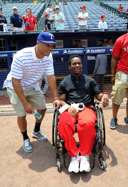 Johnathan Taylor and fellow draftee Zach Cone, left, spend time together before the Rangers...