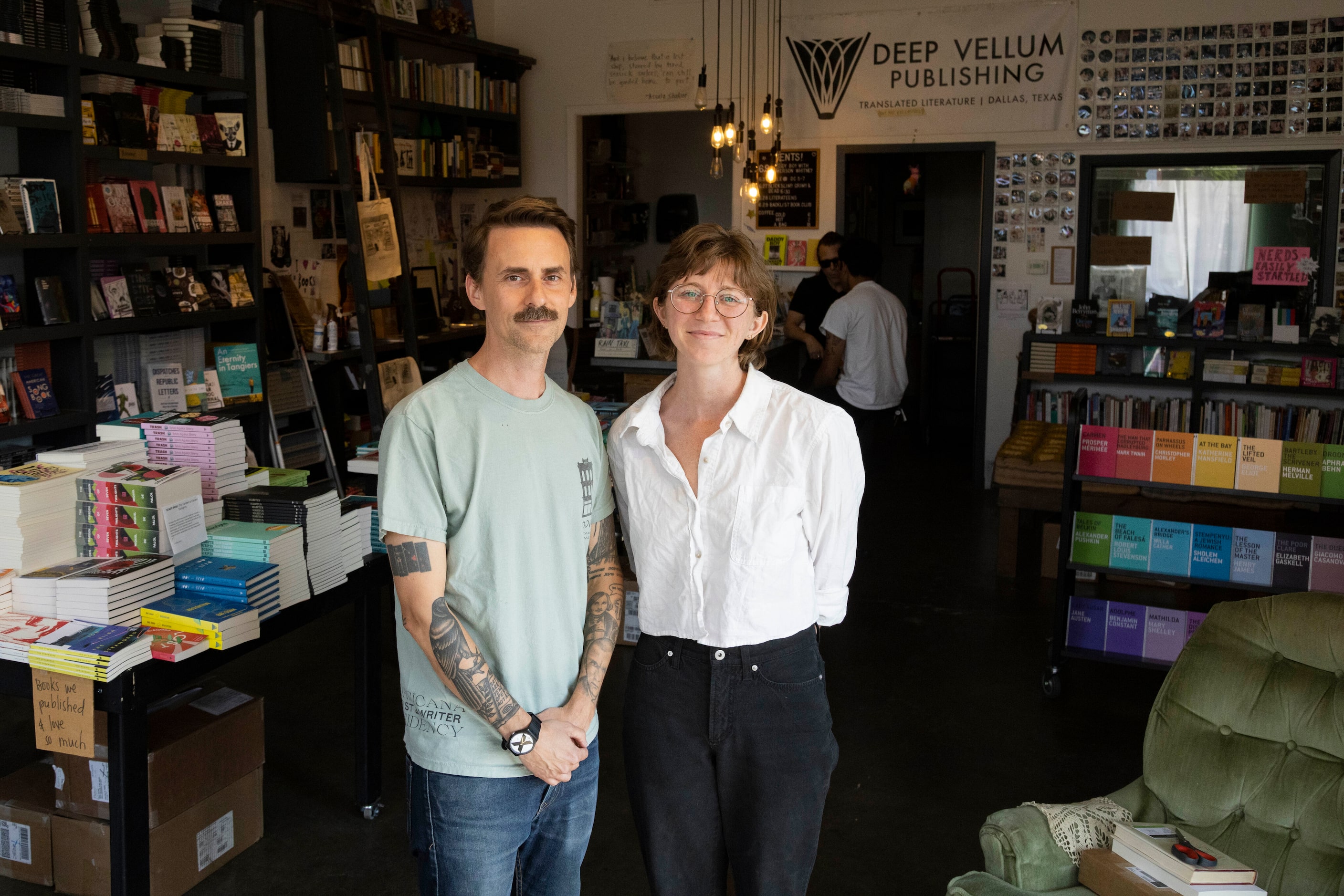 Founder Will Evans and manager Riley Rennhack pose for a photo at Deep Vellum Bookstore &...