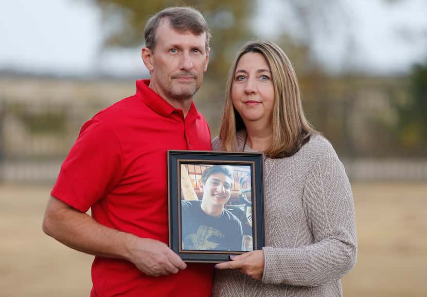 Bruce and Wendy Tyler with a photo of their son, Christian, who struggled with depression...